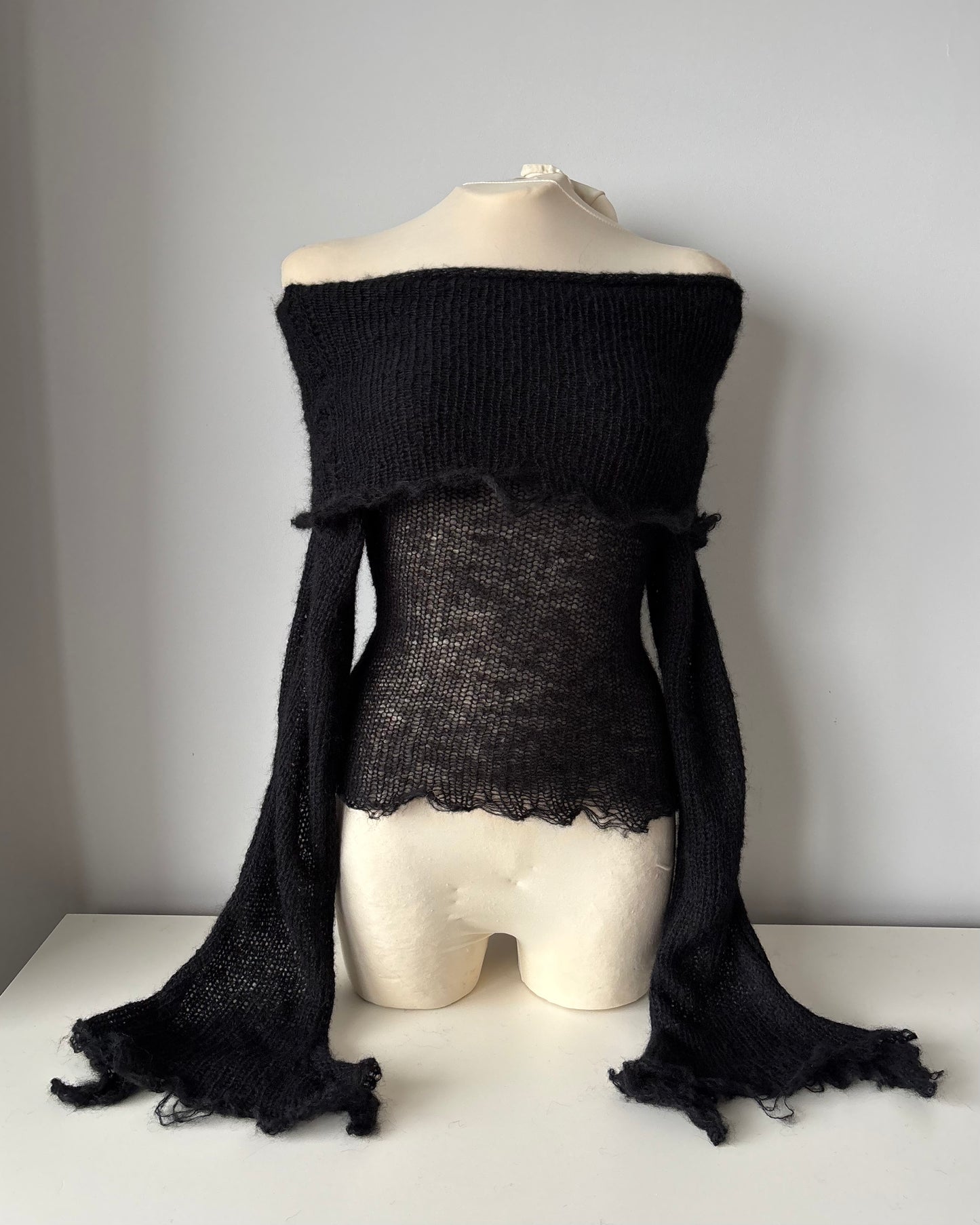 OFF-SHOULDER BLACK SWEATER