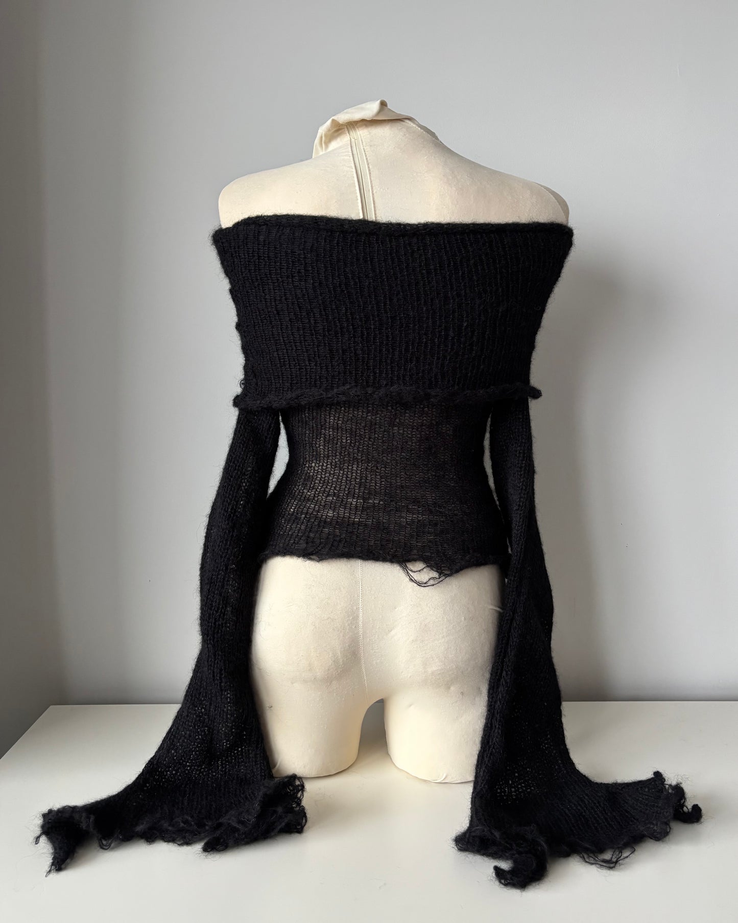 OFF-SHOULDER BLACK SWEATER