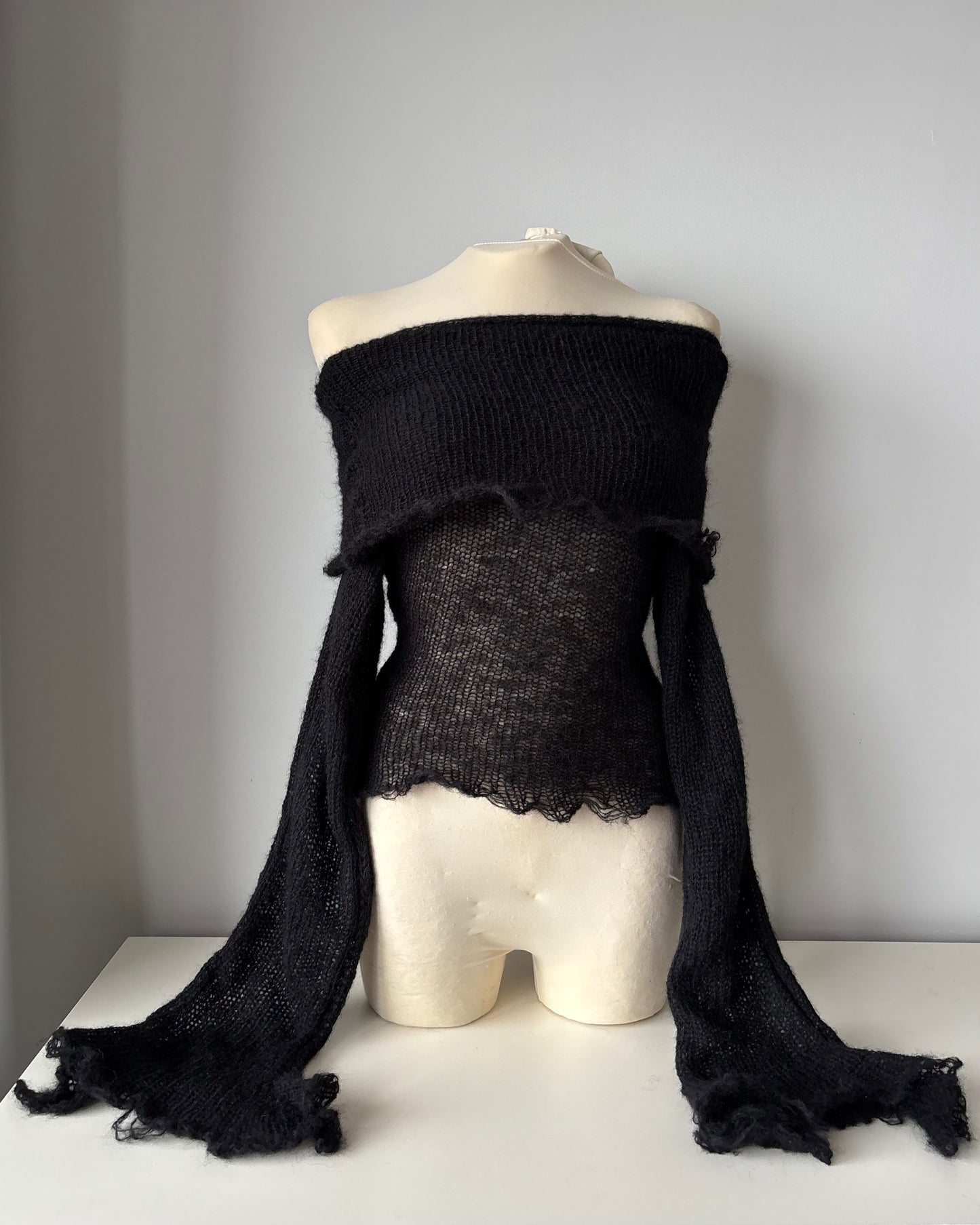 OFF-SHOULDER BLACK SWEATER