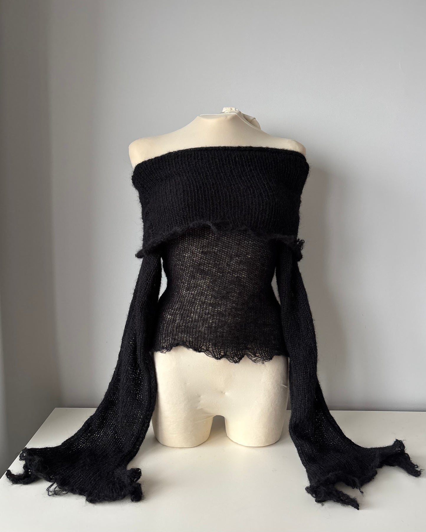 OFF-SHOULDER BLACK SWEATER